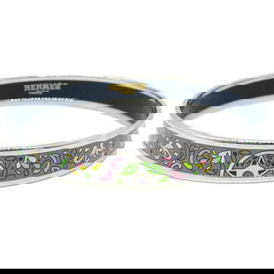 Hermes Enamel Cloisonne Bangle Silver Plated: Hermes Enamel Cloisonne Bangle Silver Plated This elegant bangle bracelet by Hermes showcases a stunning silver-plated finish, making it a timeless accessory for any occasion. Its vintage charm is com