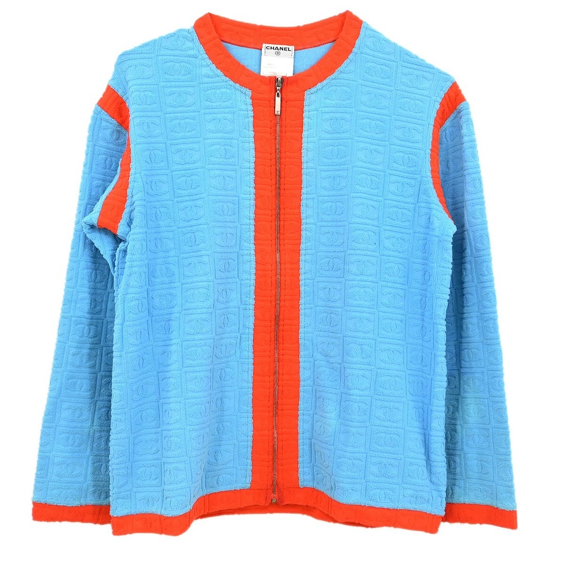 Chanel Vintage Light Blue Zip-up Jacket 02S #42: Chanel Vintage Light Blue Zip-up Jacket 02S #42 Elevate your casual wardrobe with this vintage Chanel zip-up collarless jacket in a light blue hue. Crafted from a blend of 90% nylon and 10% spandex, t