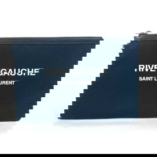 Saint Laurent 581369 Rive Gauche Bicolor Clutch Bag 20cm x 29cm: Saint Laurent 581369 Rive Gauche Bicolor Clutch Bag 20cm x 29cm This stylish Saint Laurent Rive Gauche Pouch is a versatile clutch bag crafted from a blend of canvas and leather, featuring a sophistic