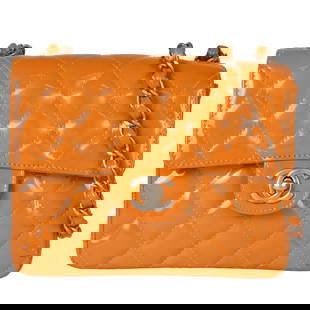 Chanel Matelasse Coco Mark Orange Enamel Shoulder Bag 2000: Chanel Matelasse Coco Mark Orange Enamel Shoulder Bag 2000 Introducing the CHANEL Matelasse Coco Mark Single Flap Bag, a stunning shoulder bag crafted from luxurious orange enamel leather. This elegan