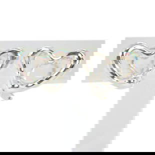 Tiffany 925 Sterling Silver Open Heart Clip Earrings 16.20mm x 20.80mm: Tiffany 925 Sterling Silver Open Heart Clip Earrings 16.20mm x 20.80mm Elevate your accessory collection with these stunning Tiffany Open Heart clip earrings. Crafted from high-quality sterling silver