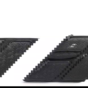 Chanel Matelasse Black Clutch Bag with Coco Mark and Multi Pockets: Chanel Matelasse Black Clutch Bag with Coco Mark and Multi Pockets This elegant Chanel clutch bag showcases a sophisticated matelasse design featuring the iconic Coco mark. Crafted from high-quality g