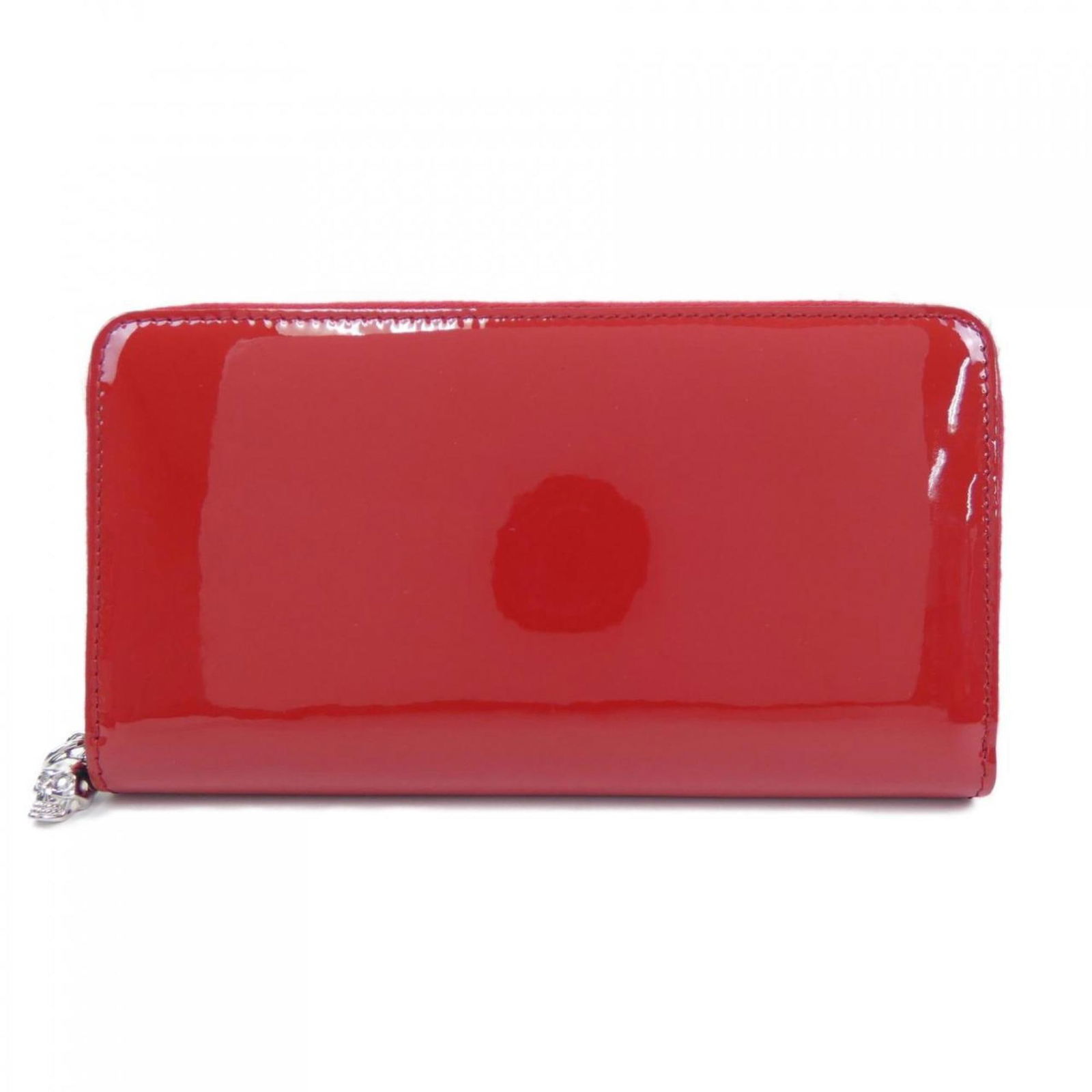 Alexander McQueen Red Bi-Fold Long Wallet for Women: Alexander McQueen Red Bi-Fold Long Wallet for Women This stylish long bi-fold wallet from Alexander McQueen is designed for women and features a vibrant red color. Its dimensions are 10.5cm x 19.5cm x