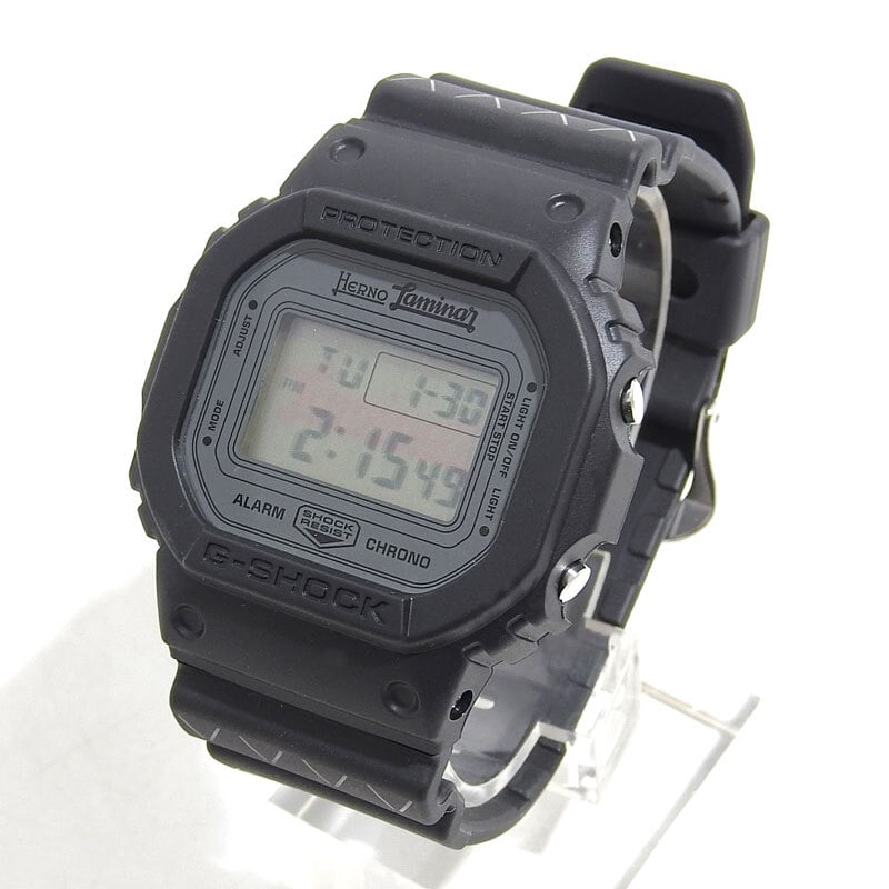 CASIO G-SHOCK Herno Laminar Quartz Watch DW-5600VT 43mm Gray Black: CASIO G-SHOCK Herno Laminar Quartz Watch DW-5600VT 43mm Gray Black The CASIO G-SHOCK Herno Laminar Men's Quartz Watch DW-5600VT is a robust wristwatch featuring a quartz movement and a stylish gray an