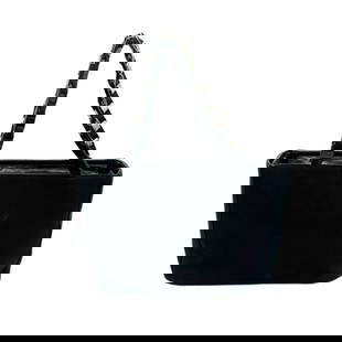 Salvatore Ferragamo Vera Chain Black Canvas Handbag 19cm x 26cm x 7cm: Salvatore Ferragamo Vera Chain Black Canvas Handbag 19cm x 26cm x 7cm This stylish Salvatore Ferragamo handbag is crafted from durable black canvas, making it a chic accessory for women. The bag featu
