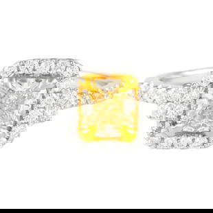 1.39ctt Fancy Yellow VS1 Cushion Diamond Ring 18k Gold: 1.39ctt Fancy Yellow VS1 Cushion Diamond Ring 18k Gold This exquisite 1.39ctt Fancy Yellow VS1 Cushion Diamond Ring is crafted in two-tone 18k gold, featuring both yellow and white gold finishes. The