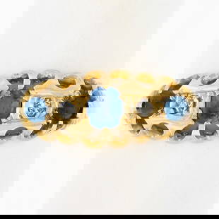 18k Yellow Gold Cushion-Cut Sapphire and Diamond Stackable Band Ring: 18k Yellow Gold Cushion-Cut Sapphire and Diamond Stackable Band Ring This exquisite band ring features an elegant design crafted in 18k yellow gold, showcasing a stunning cushion-cut blue sapphire com