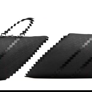 Louis Vuitton Monogram Taurillon Keepall 50 Black Leather Travel Bag: Louis Vuitton Monogram Taurillon Keepall 50 Black Leather Travel Bag Elevate your style with the Louis Vuitton Monogram Taurillon Keepall Bandouliere 50, a luxurious travel bag crafted from embossed l