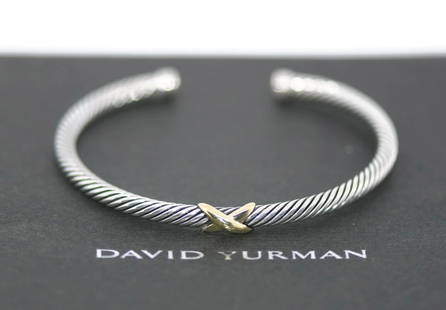 David Yurman 18K Gold Sterling Silver Cuff Bracelet 4mm Authentic: David Yurman 18K Gold Sterling Silver Cuff Bracelet 4mm Authentic This exquisite David Yurman bracelet features a stunning combination of 18K gold and sterling silver in a stylish cuff design. Crafted
