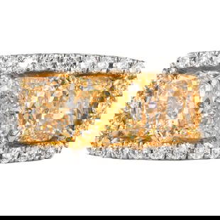 5.25 Carat 3-Stone Yellow Diamond Ring in 18k White and Yellow Gold: 5.25 Carat 3-Stone Yellow Diamond Ring in 18k White and Yellow Gold This exquisite 3-stone ring showcases a stunning collection of yellow diamonds set in a luxurious two-tone design. The ring features
