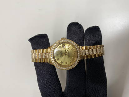 Rolex Datejust 6531 Ladies Champagne Diamond Dial President Bracelet: Rolex Datejust 6531 Ladies Champagne Diamond Dial President Bracelet This exquisite Rolex Datejust watch is designed for ladies and features a stunning champagne diamond dial, accentuated by a pave be