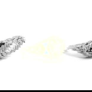 Antique Art Deco 18k White Gold Filigree Ring with .28ct Diamond and Sapphire: Antique Art Deco 18k White Gold Filigree Ring with .28ct Diamond and Sapphire This exquisite Antique Art Deco ring features a stunning .28 ct old-cut diamond and vibrant sapphire, all set in crisp fil