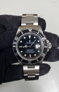 Rolex Submariner Black Dial Oyster Ref 168000 Men's Watch: Rolex Submariner Black Dial Oyster Ref 168000 Men's Watch This exquisite Rolex Submariner features a classic black dial and an Oyster case, reference number 168000. Designed for men, this timepiece sh
