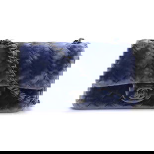 Chanel Mini Matelasse Coco Mark Blue Velour Shoulder Bag: Chanel Mini Matelasse Coco Mark Blue Velour Shoulder Bag Elevate your accessory collection with this Chanel Mini Matelasse Coco Mark Chain Shoulder Bag. Crafted from high-quality leather with a luxuri