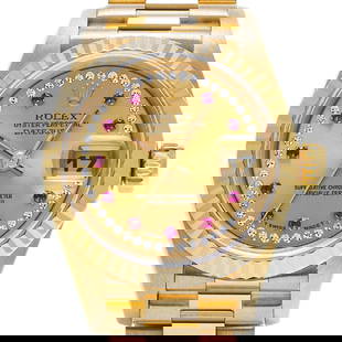 ROLEX Datejust 69178LR Ladies Watch Yellow Gold Diamonds Ruby 1996: ROLEX Datejust 69178LR Ladies Watch Yellow Gold Diamonds Ruby 1996 This exquisite ROLEX Datejust 69178LR ladies' wristwatch, manufactured around 1996, showcases the brand's commitment to precision and