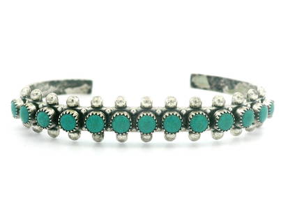 Navajo Sterling Silver Turquoise Cuff Bracelet Unisex 6.75 inches: Navajo Sterling Silver Turquoise Cuff Bracelet Unisex 6.75 inches This stunning Navajo cuff bracelet showcases a beautiful arrangement of round turquoise stones set in high-quality sterling silver, ma
