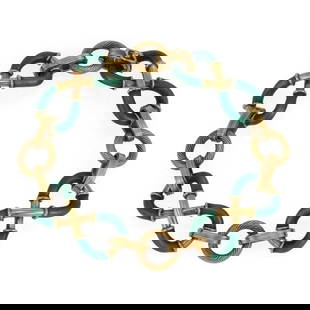 Vintage 18k Yellow Gold Green Enamel Infinity Bracelet 18k Italy Hallmarked: Vintage 18k Yellow Gold Green Enamel Infinity Bracelet 18k Italy Hallmarked This exquisite vintage bracelet is crafted from 18k yellow gold, featuring four infinity-style links adorned with vibrant gr