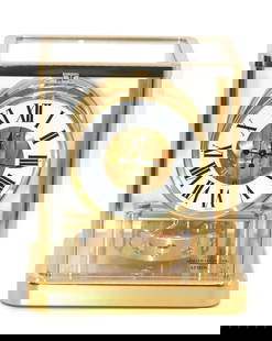 Jaeger LeCoultre Atmos Desk Clock Ref Q5107202 with Box: Jaeger LeCoultre Atmos Desk Clock Ref Q5107202 with Box This Jaeger LeCoultre Atmos Clock (Ref: Q5107202) is a stunning desk clock that combines exceptional craftsmanship and elegant design. It is 100