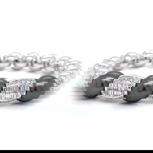 18K White Gold Bangle Bracelet with South Sea Pearls and Diamonds: 18K White Gold Bangle Bracelet with South Sea Pearls and Diamonds This exquisite 18K White Gold Bangle Bracelet features stunning South Sea Pearls and a dazzling array of diamonds. The bracelet weighs