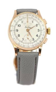 Breitling Vintage Chronograph 18K Rose Gold Watch Ref 289: Breitling Vintage Chronograph 18K Rose Gold Watch Ref 289 This exquisite Breitling Vintage Chronograph wristwatch features a luxurious 18K rose gold case and bezel with a striking silver dial. The wat