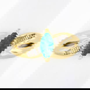 14k Yellow Gold 0.66ctw Marquise Emerald and Baguette Diamond Engagement Ring: 14k Yellow Gold 0.66ctw Marquise Emerald and Baguette Diamond Engagement Ring This exquisite 14k yellow gold engagement ring features a stunning marquise emerald as the centerpiece, complemented by ba