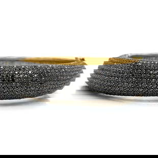 Elegant 18K Yellow Gold Silver Black Diamond Bangle 25.00 Ct: Elegant 18K Yellow Gold Silver Black Diamond Bangle 25.00 Ct This stunning bangle features a striking combination of 18K yellow gold and silver, elegantly set with approximately 25.00 ct of captivatin