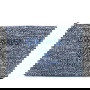 Chanel Large Tweed Deauville O Case Clutch Blue Fabric Bag: Chanel Large Tweed Deauville O Case Clutch Blue Fabric Bag The Chanel Large Tweed Deauville O Case clutch bag features a tweed body and a top zip closure. This elegant clutch includes a secure top zip