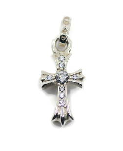 Chrome Hearts Cross Pendant Sterling Silver with Cubic Zirconia: Chrome Hearts Cross Pendant Sterling Silver with Cubic Zirconia This exquisite pendant from Chrome Hearts features a striking cross design crafted from sterling silver, accentuated by shimmering cubic
