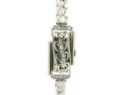 Vintage Jaeger-LeCoultre 14k Gold Diamond Floral Link Bracelet Watch: Vintage Jaeger-LeCoultre 14k Gold Diamond Floral Link Bracelet Watch This exquisite vintage wristwatch by Jaeger-LeCoultre features a mechanical (manual) movement and showcases a stunning floral dial