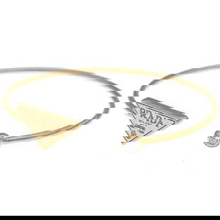 Prada Eternal Diamond Charm Bracelet 18K Yellow Gold 1JB399_2CID_F00Y4: Prada Eternal Diamond Charm Bracelet 18K Yellow Gold 1JB399_2CID_F00Y4 This exquisite charm bracelet by Prada is crafted from 18K yellow gold and features a stunning diamond embellishment. Designed fo