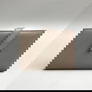 CELINE Gray Leather Bifold Wallet Mini Coin Purse 3.93 x 5.51: CELINE Gray Leather Bifold Wallet Mini Coin Purse 3.93 x 5.51 Introducing the CELINE Logo Leather Genuine Bifold Wallet, a stylish and functional accessory designed for women. Crafted from high-qualit