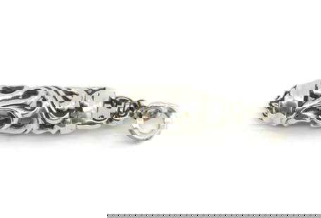 Chrome Hearts 925 Sterling Silver Pendant 54mm Authentic: Chrome Hearts 925 Sterling Silver Pendant 54mm Authentic This exquisite Chrome Hearts pendant showcases a stunning design crafted from high-quality 925 sterling silver. With a size of 54mm and a weigh