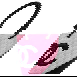 Chanel Cambon Ligne Pink Calfskin Tote Handbag with Quilted Finish: Chanel Cambon Ligne Pink Calfskin Tote Handbag with Quilted Finish This exquisite Chanel Cambon Ligne Tote Handbag showcases a stunning pink calfskin leather exterior with a logo quilted finish, exudi