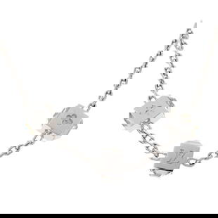 Louis Vuitton Vintage Silver Plated Necklace with Rhinestone Charm: Louis Vuitton Vintage Silver Plated Necklace with Rhinestone Charm Elevate your style with this exquisite Louis Vuitton Necklace. Featuring a stunning silver-plated charm pendant, this vintage piece i