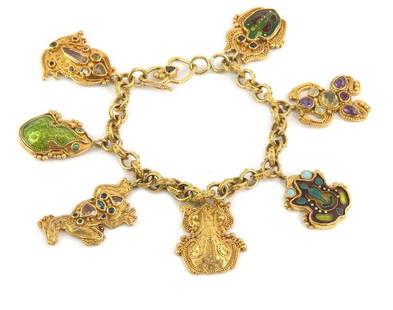 Luna Felix 22k 18k Gold Frog Charms Bracelet with Gemstones: Luna Felix 22k 18k Gold Frog Charms Bracelet with Gemstones This exquisite bracelet by designer Luna Felix showcases a unique combination of 22k and 18k yellow gold in a fancy round link chain design