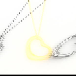 Tiffany & Co. Elsa Peretti Open Heart Pendant 18k Yellow Gold Chain: Tiffany & Co. Elsa Peretti Open Heart Pendant 18k Yellow Gold Chain Discover the elegance of this authentic Tiffany & Co. Open Heart Pendant from designer Elsa Peretti's iconic collection. Crafted fro