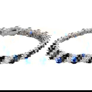 Harbor Diamonds 18K White Gold Sapphire Diamond Tennis Bracelet 22.80 CTTW: Harbor Diamonds 18K White Gold Sapphire Diamond Tennis Bracelet 22.80 CTTW This exquisite tennis bracelet is crafted from 18K white gold, showcasing a stunning arrangement of 19 oval-cut blue sapphire