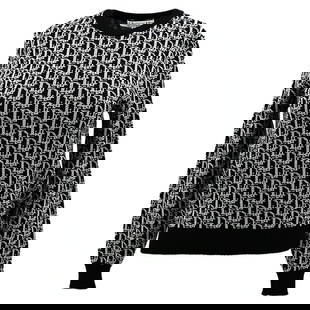 Christian Dior Black Sweater Size M: Christian Dior Black Sweater Size M Elevate your casual wardrobe with this stylish Christian Dior Black Sweater. Featuring a round neckline and long sleeves, this sweater is designed for comfort and v