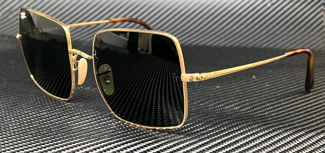 Ray-Ban RB1971 Square Gold Frame Green Lenses Women's Sunglasses: Ray-Ban RB1971 Square Gold Frame Green Lenses Women's Sunglasses Elevate your style with these Ray-Ban RB1971 914731 Gold Green Women's Sunglasses. Featuring a classic square design, these sunglasses