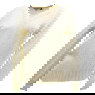 Christian Dior Ivory V-Neck Long Sleeve Sweater with Logo: Christian Dior Ivory V-Neck Long Sleeve Sweater with Logo This elegant Christian Dior sweater features a classic V-neckline and long sleeves, making it perfect for casual occasions. The sweater is des