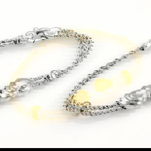 Tiffany & Co. Hearts Bracelet 18k Gold Sterling Silver Rope Chain: Tiffany & Co. Hearts Bracelet 18k Gold Sterling Silver Rope Chain Elevate your accessory collection with this exquisite bracelet from Tiffany & Co. Crafted from solid 18k yellow gold and sterling silv