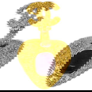 Chanel Gripoix Gold-Plated Brooch with Red Accents 94A: Chanel Gripoix Gold-Plated Brooch with Red Accents 94A This exquisite Chanel Gripoix Brooch Pin features a stunning gold-plated design adorned with vibrant red accents. The piece showcases the