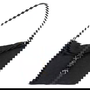 Gucci Jackie 001 3734 Black GG Canvas Leather Shoulder Bag: Gucci Jackie 001 3734 Black GG Canvas Leather Shoulder Bag Introducing the Gucci Jackie shoulder bag, a stylish accessory crafted from durable GG canvas leather in a classic black hue. This bag