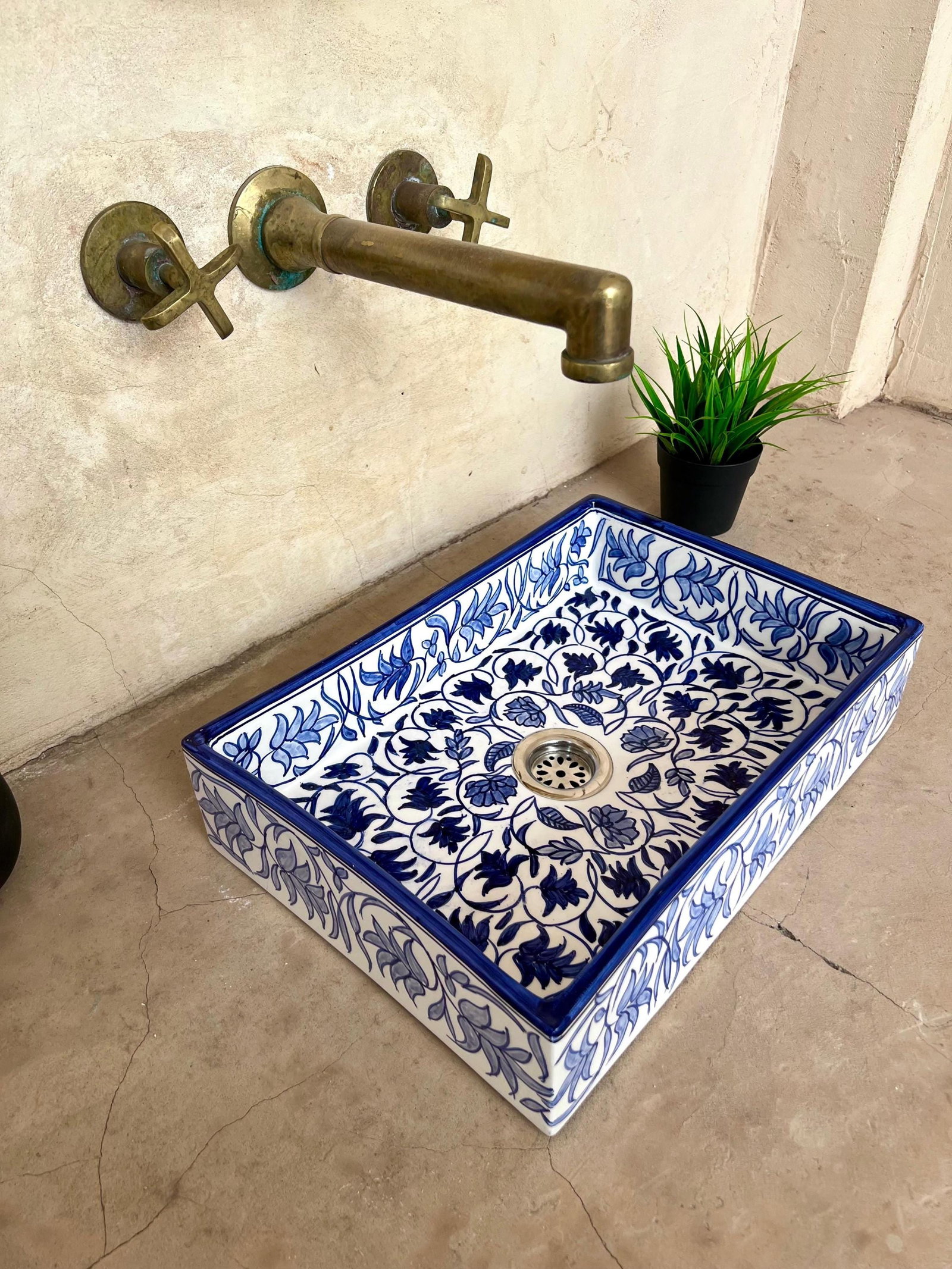Handmade Moroccan Ceramic Rectangular Sink with Copper and Silver Drains: Handmade Moroccan Ceramic Rectangular Sink with Copper and Silver Drains This exquisite Moroccan rectangular washbasin sink is 100% handmade by skilled artisans, showcasing traditional hand-painted de