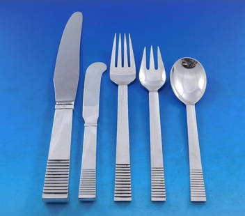 Georg Jensen Parallel Sterling Silver Flatware Set for 12, 64 Pieces Art Deco: Georg Jensen Parallel Sterling Silver Flatware Set for 12, 64 Pieces Art Deco Introducing the exquisite Parallel Sterling Silver Flatware Set by Georg Jensen, designed in the Art Deco style. This rema