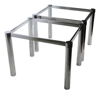 Chic 1970s Post Modern Chrome Glass End Tables Pair: Chic 1970s Post Modern Chrome Glass End Tables Pair Chic pair of chrome and glass side, or end, tables in very good original condition. The tables feature tubular chrome legs, with squared chrome fram