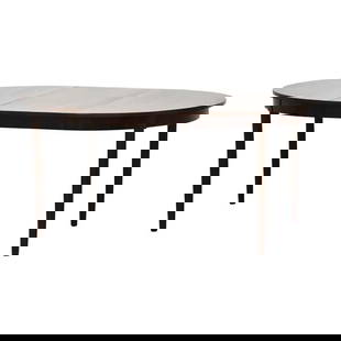 1960s Danish Modern Rosewood Oval Dining Table 63" Extendable: 1960s Danish Modern Rosewood Oval Dining Table 63" Extendable This exquisite 1960s Danish Modern Oval Dining Table is crafted from rich rosewood, showcasing a stunning brown hue. The table features a
