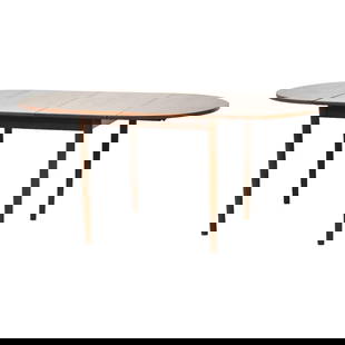 1960s Danish Modern Teak Oval Drop Leaf Dining Table: 1960s Danish Modern Teak Oval Drop Leaf Dining Table This exquisite mid-century modern dining table showcases a beautiful teak construction with an elegant oval shape. The table features a drop-leaf d