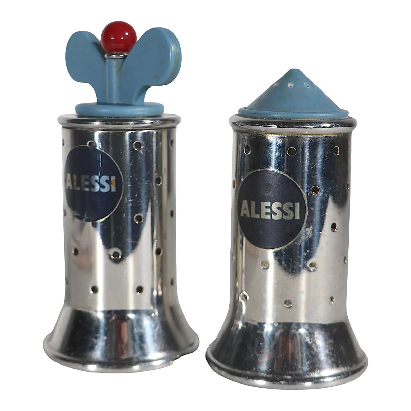 Michael Graves Memphis School Salt and Pepper Set Alessi 1980s Chrome Design: Michael Graves Memphis School Salt and Pepper Set Alessi 1980s Chrome Design This chic pair of salt and pepper shakers, designed by Michael Graves for Alessi in the 1980s, embodies the voguish style o