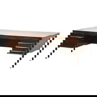 Mid-Century Modern Rosewood Executive Desk by Haug Snekkeri 77.75" Wide: Mid-Century Modern Rosewood Executive Desk by Haug Snekkeri 77.75" Wide This exquisite mid-century modern desk, designed by Haug Snekkeri for Bruksbo, showcases a stunning rosewood finish. Ideal for a